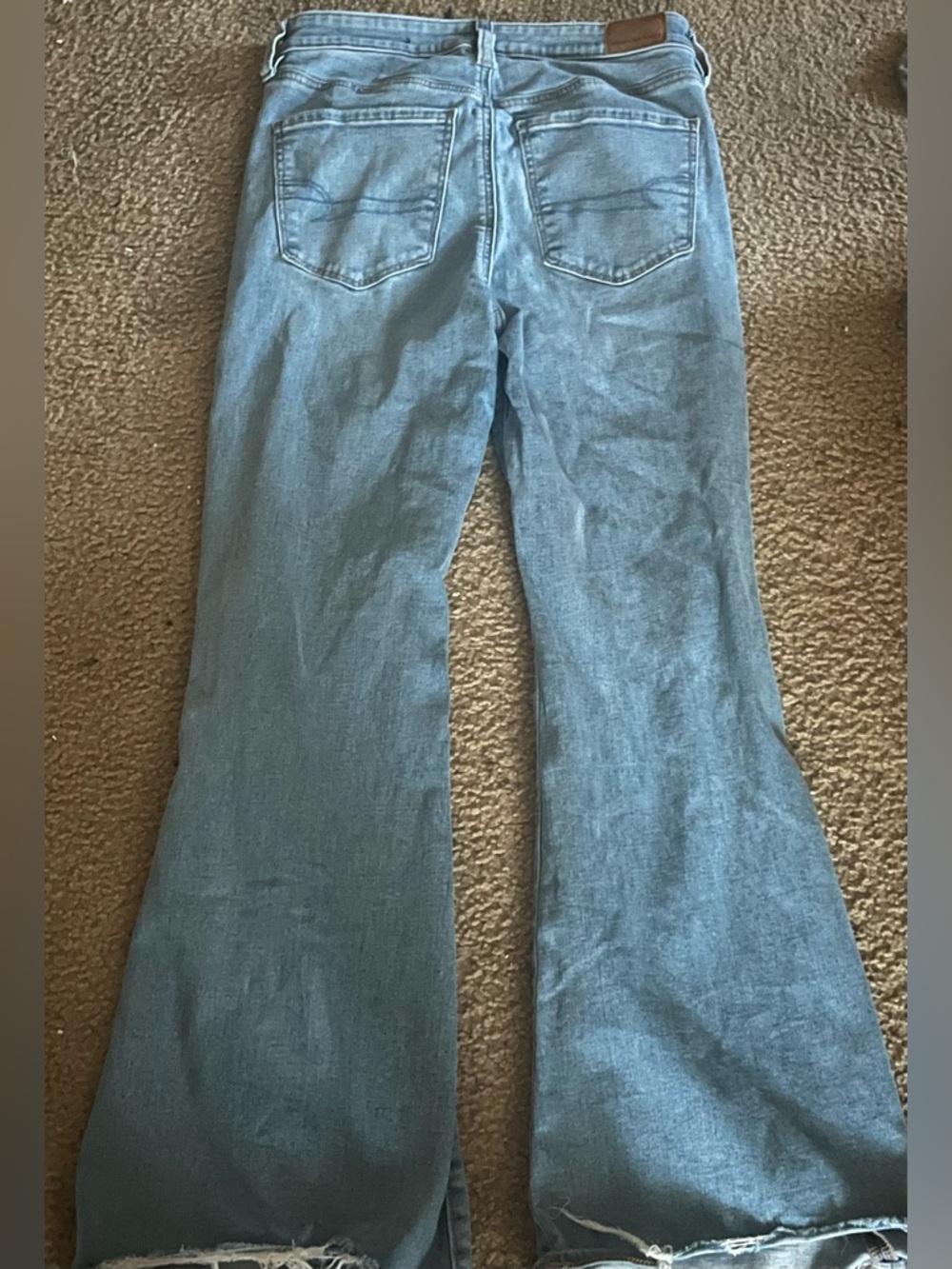 Light Wash distressed Flared Jeans - Blue